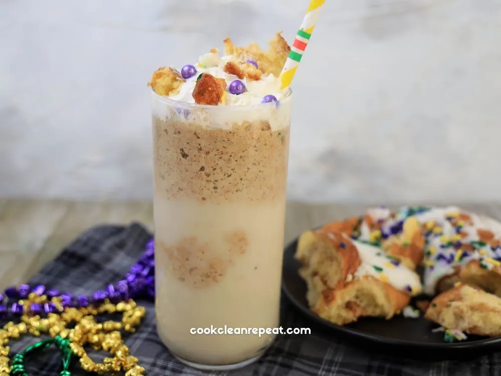 Starbucks Copycat King Cake Frappuccino from the front with a cake piece off to the side