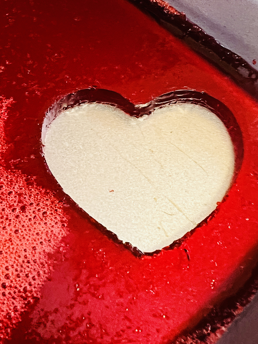 heart shape in a sheet of red jello