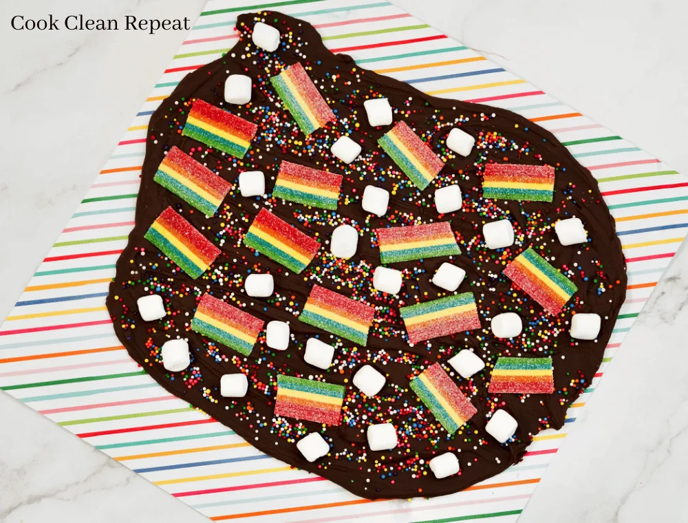 candy leprechaun bark spread out on striped paper