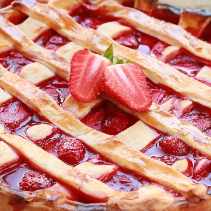 a baked pie filled with strawberry pie filling