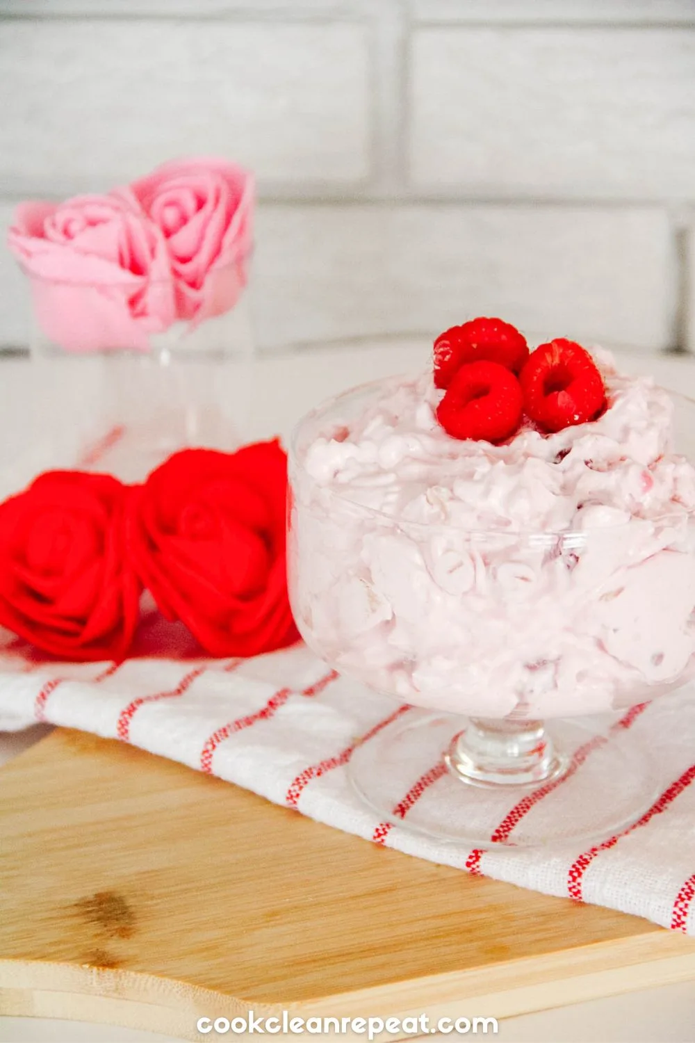 cherry fluff salad close close up with roses and raspberries