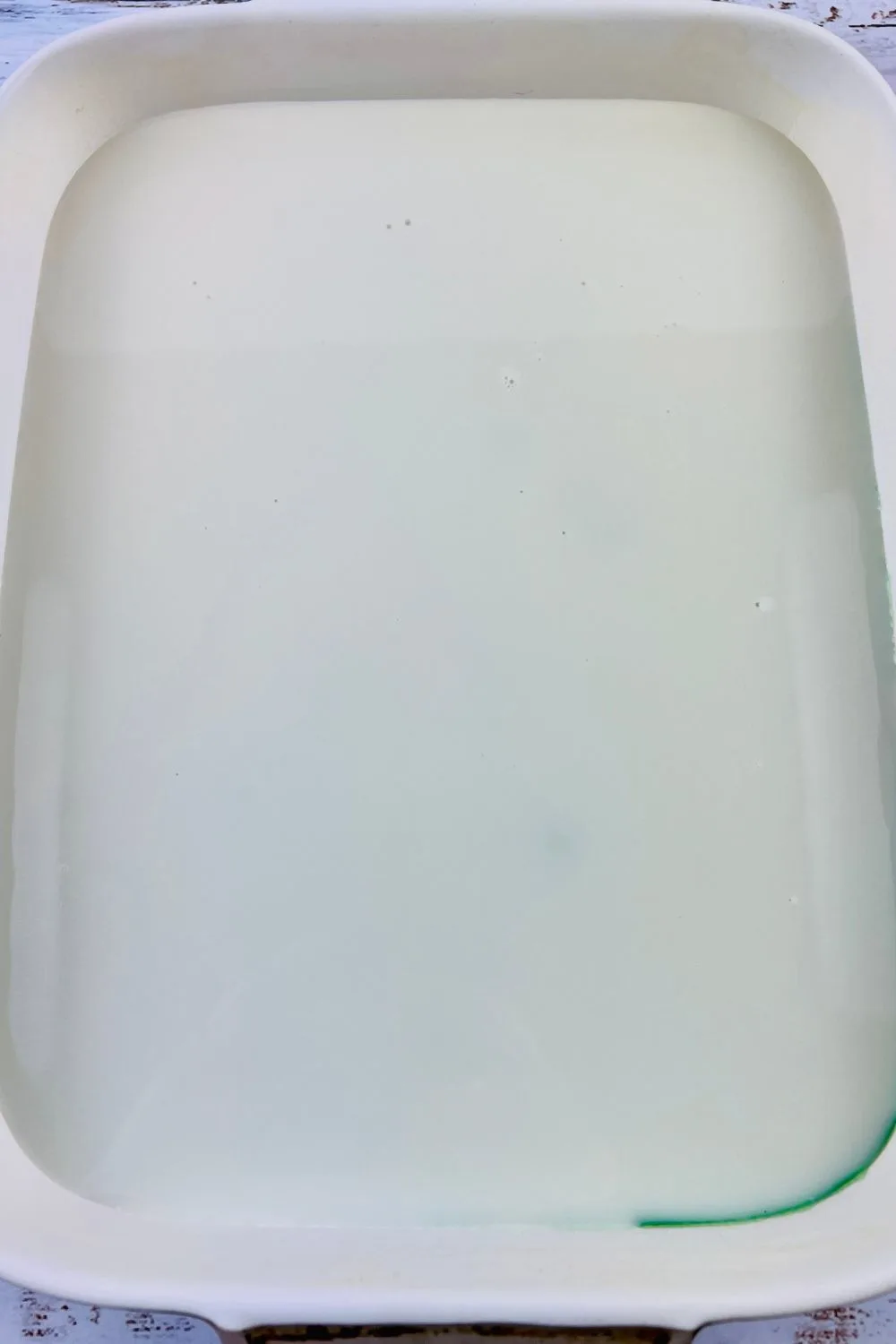 white jello setting in a pan