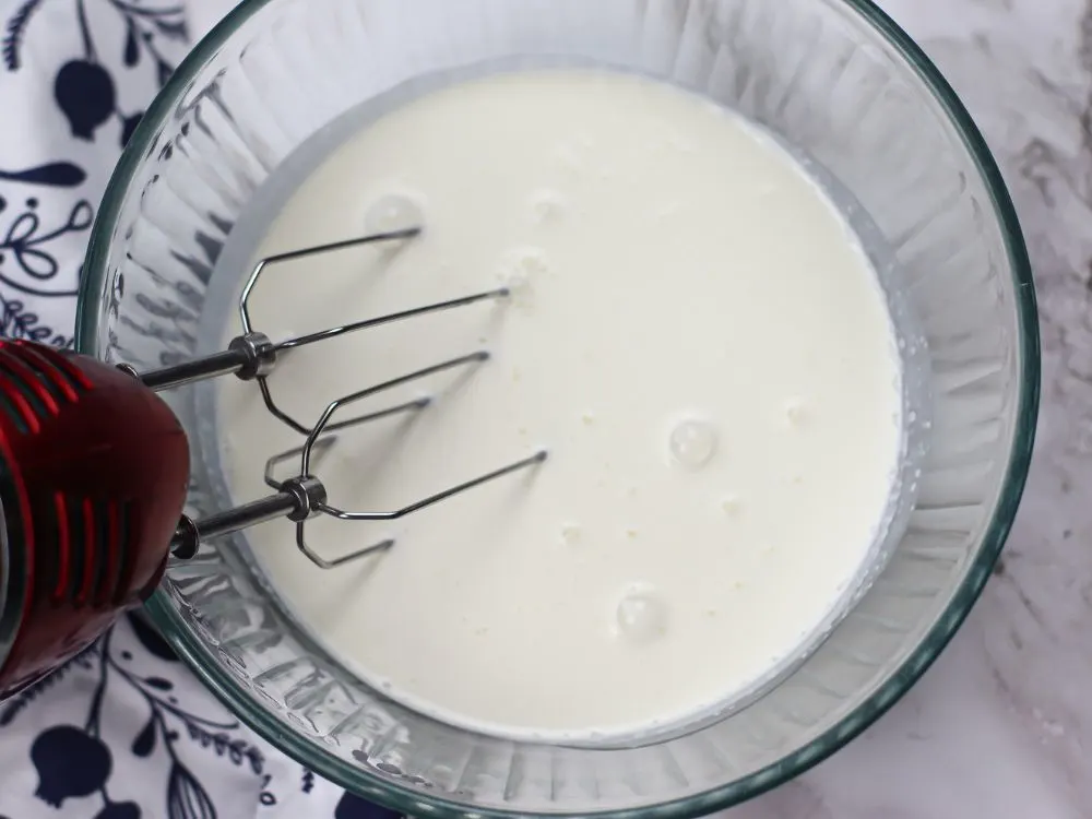 mixing the heavy whipping cream