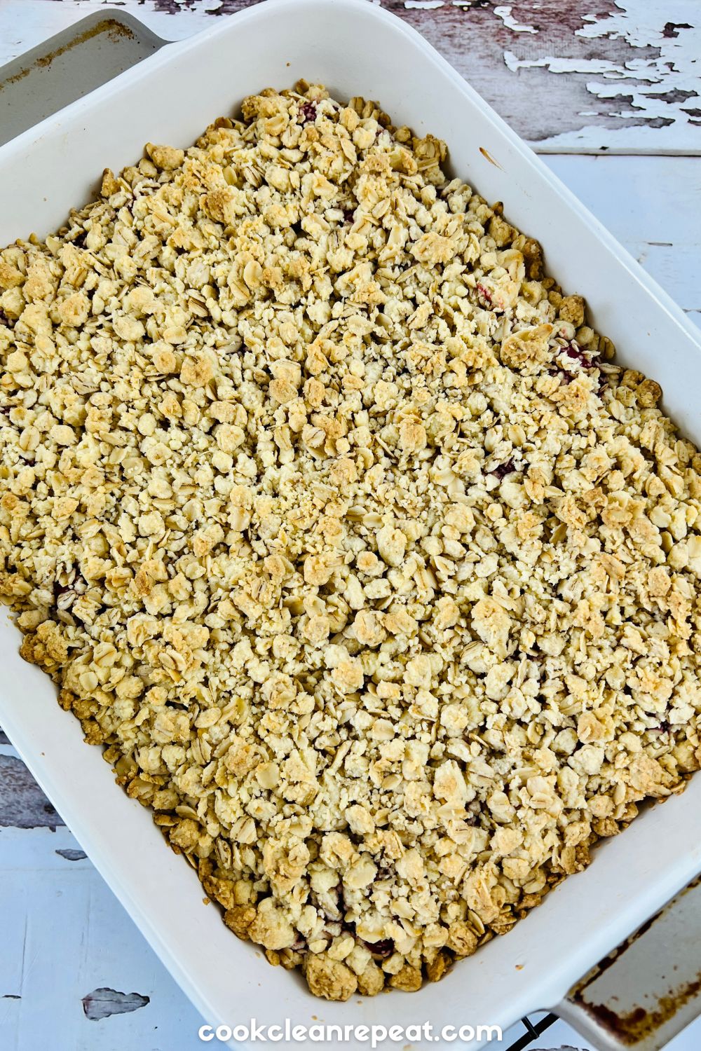 The cherry bars in a baking dish after being taken out of the oven