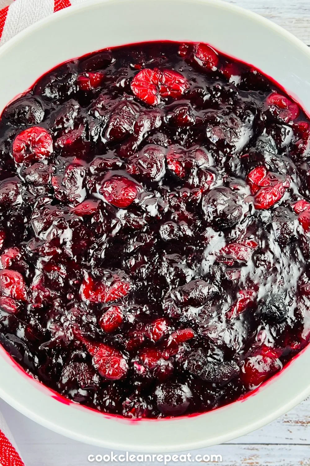 Cherry Pie Filling in a bowl close up showing texture