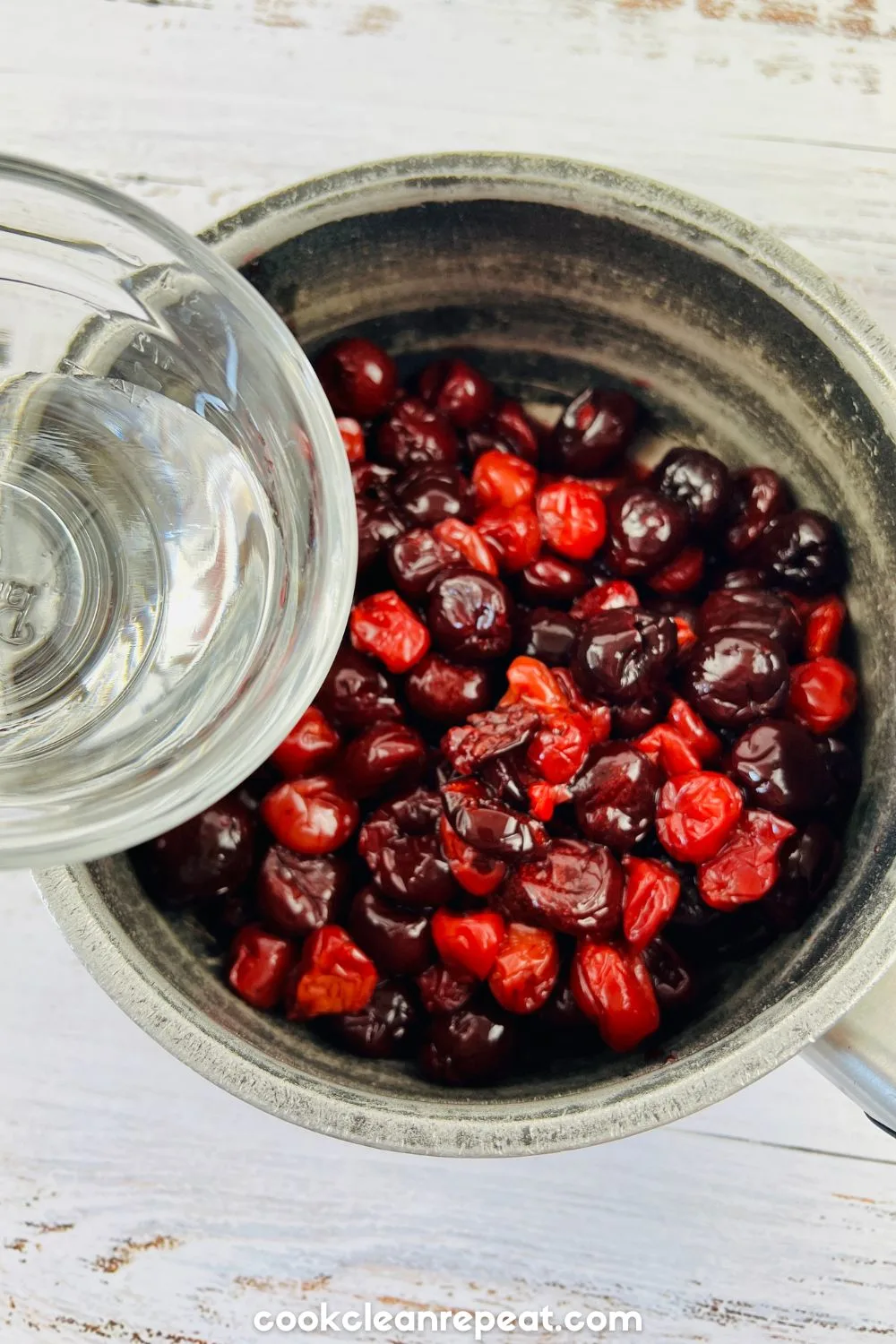 adding water to the cherries