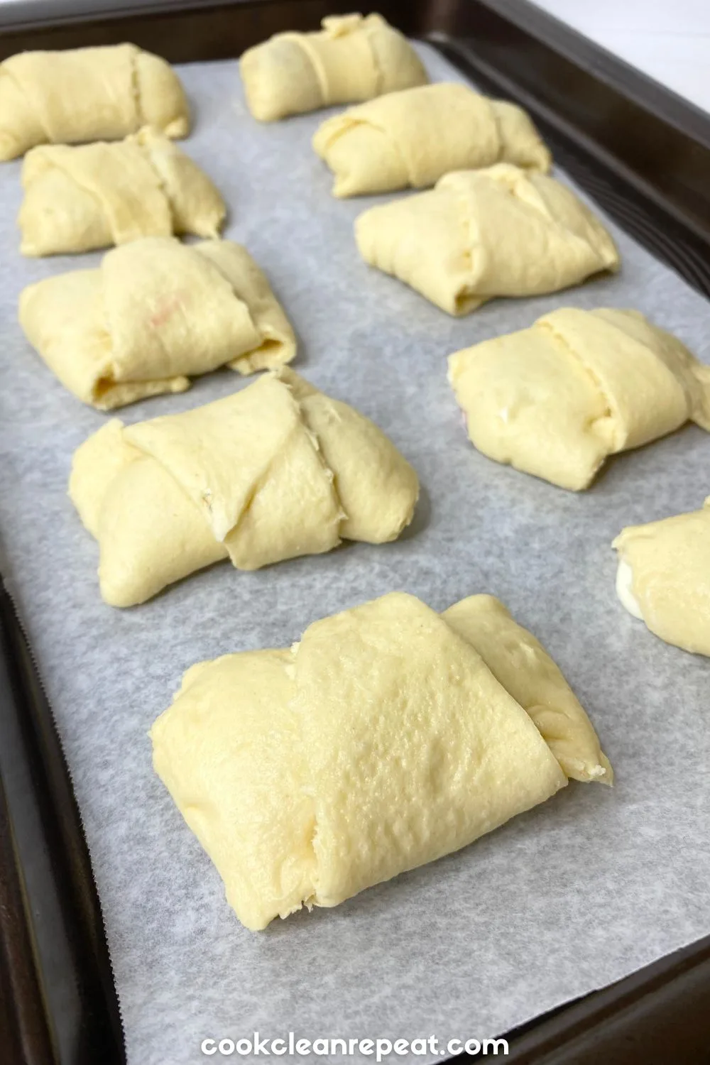 Crescent Roll Cherry Turnovers on a pan