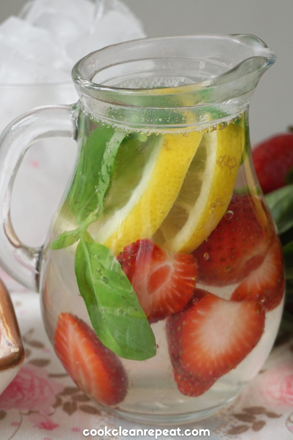 a close up of a clear water pitcher ready to be served