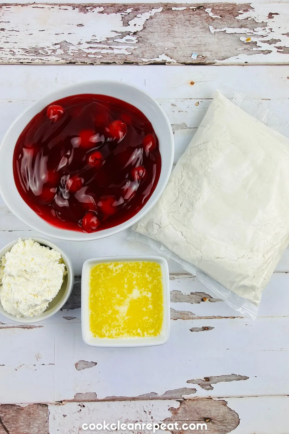 ingredients for making a cherry cheesecake dump cake