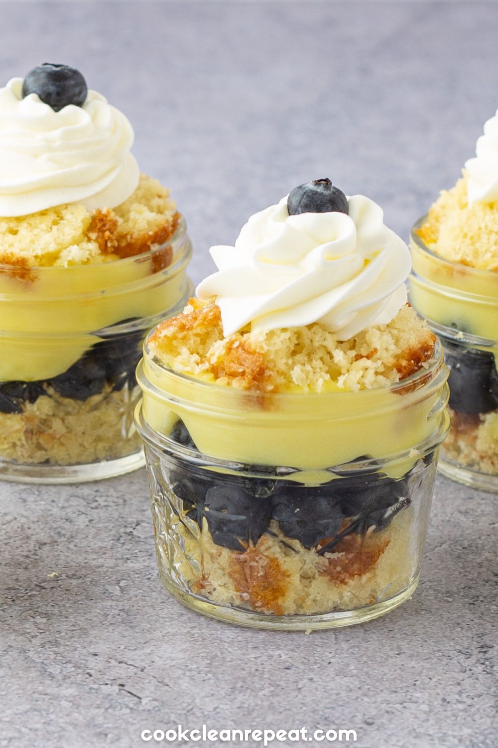 up close view of blueberry lemon pudding cakes