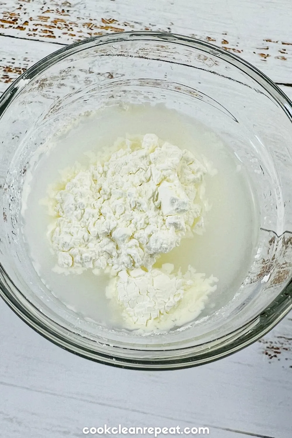 water and cornstarch added together in a mixing bowl