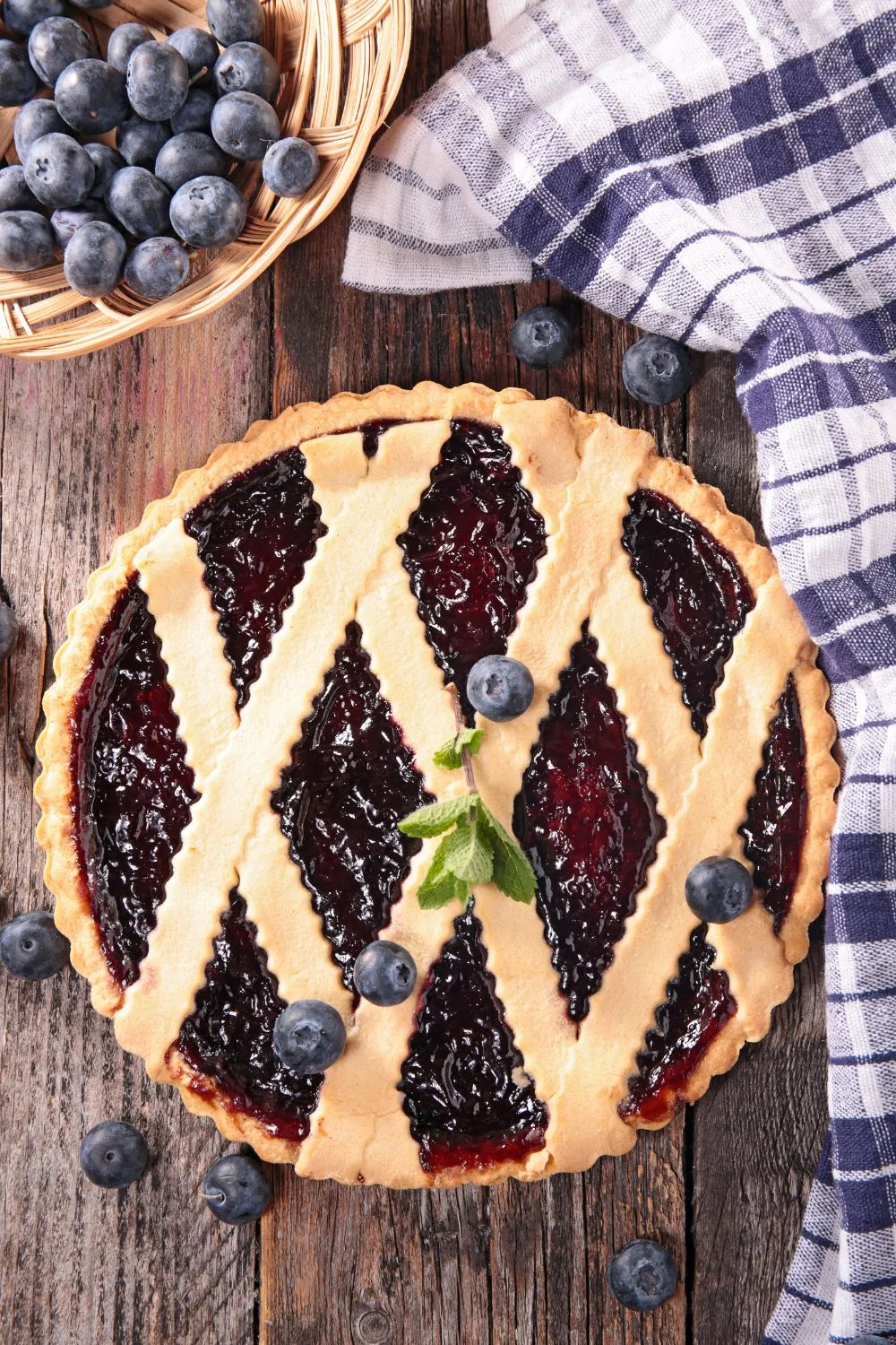 an overhead shot of a blueberry pie