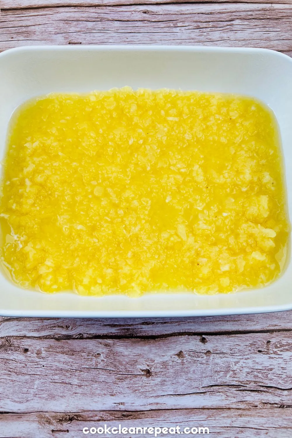 pineapple spread into a baking dish