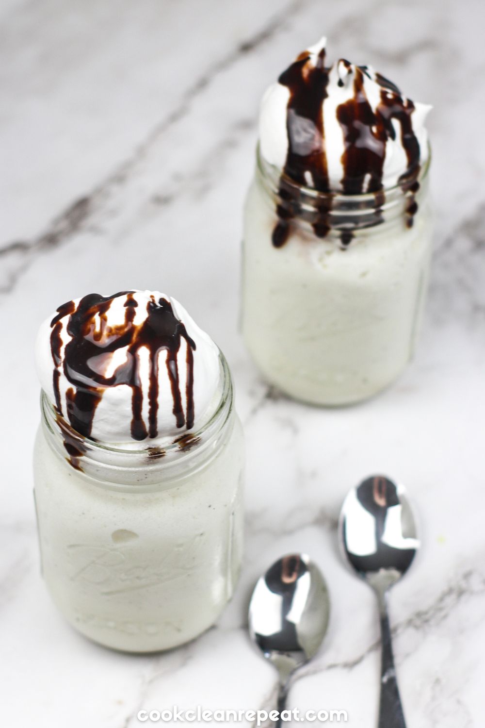 two servings of starbucks vanilla frappuccino in mason jars