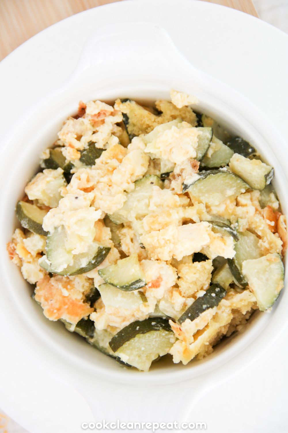 Zucchini Casserole served in a white bowl pictured from above