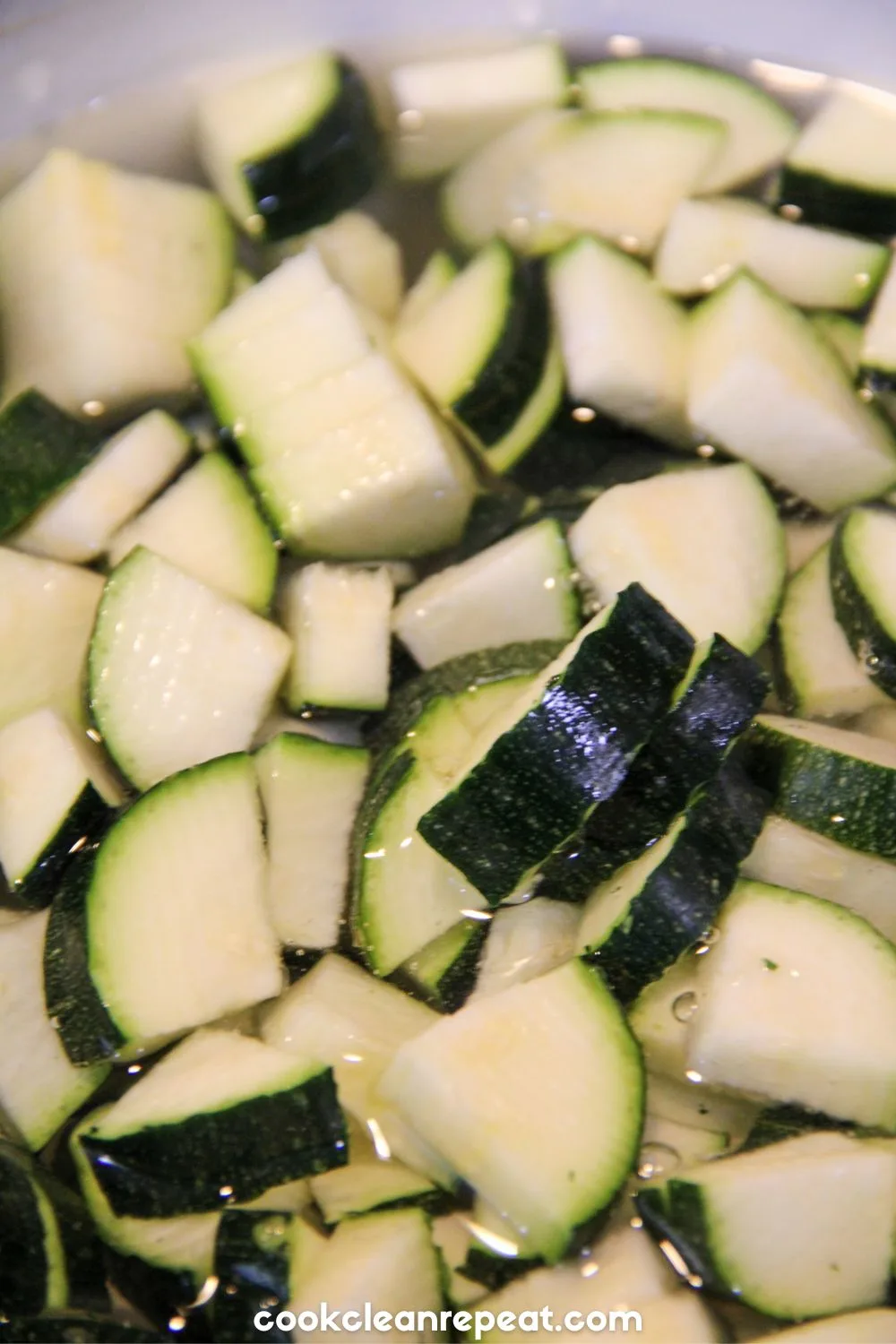 a close up photo of cut up pieces of zucchini
