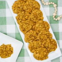 a plate of Pumpkin Oatmeal Drop Cookies on a green checkered background