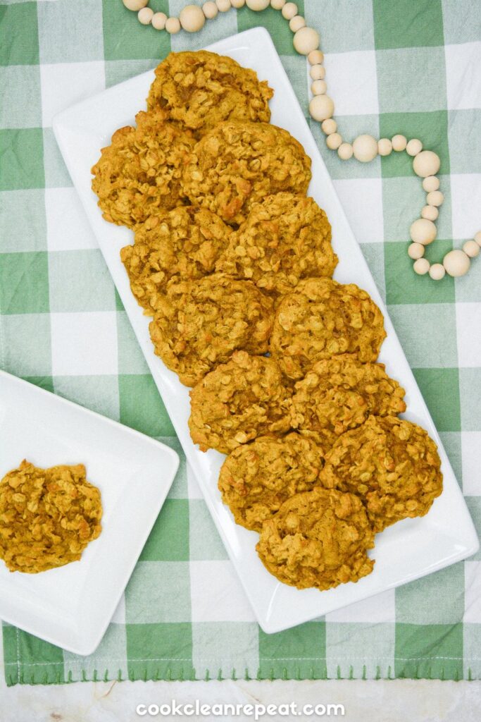 a plate of Pumpkin Oatmeal Drop Cookies on a green checkered background