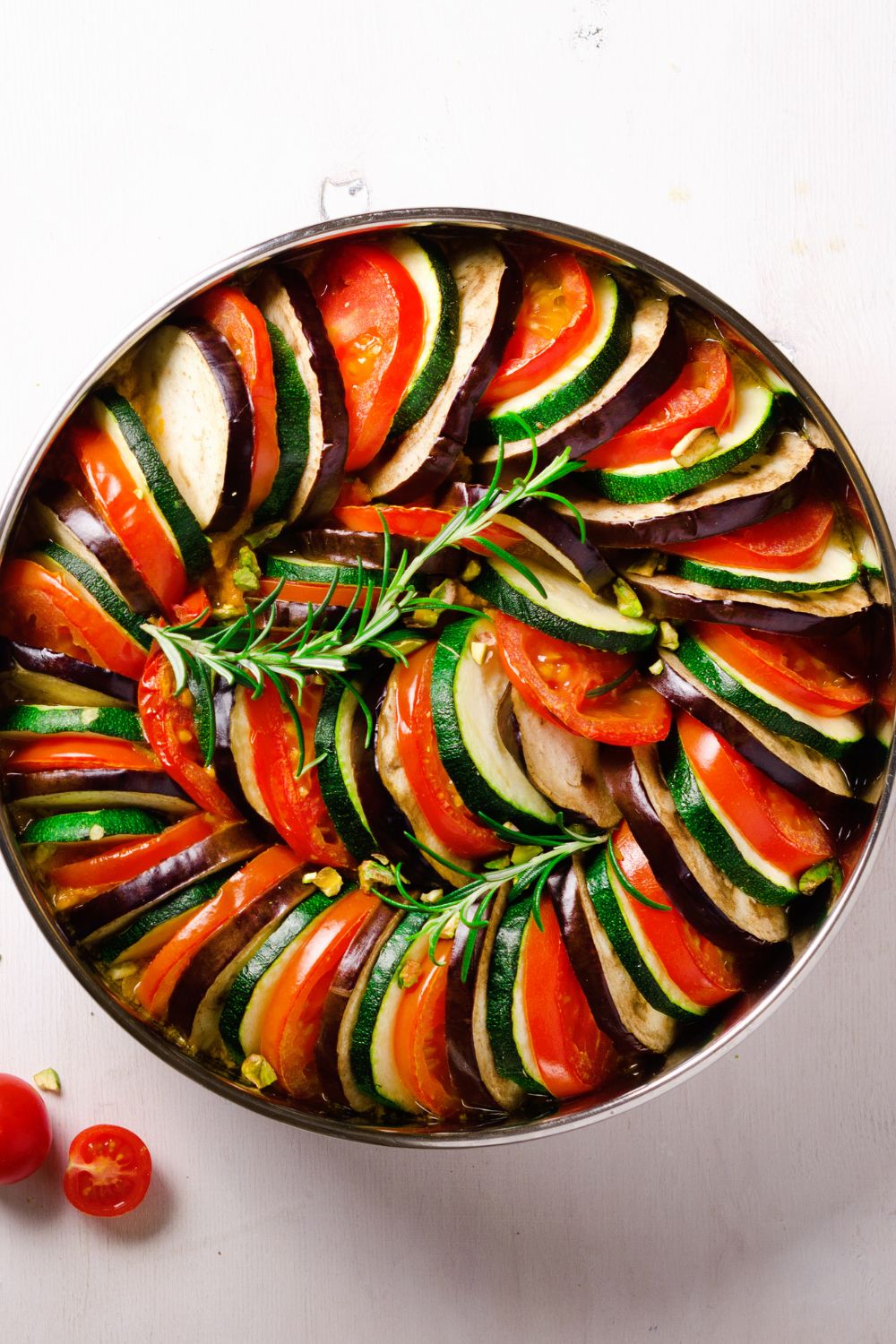 zucchini tomato eggplant in a bowl