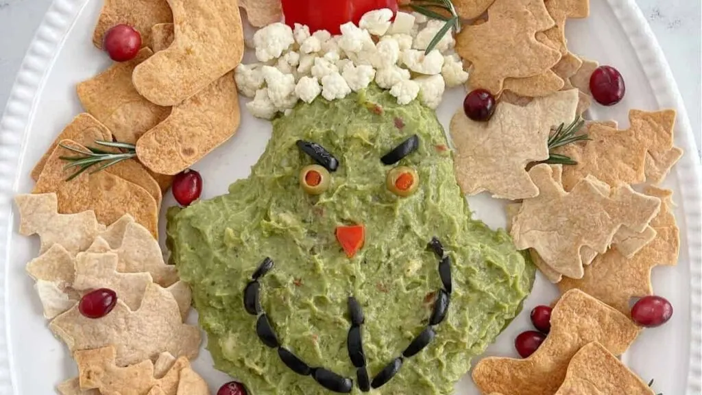 A Grinch face made of guacamole.