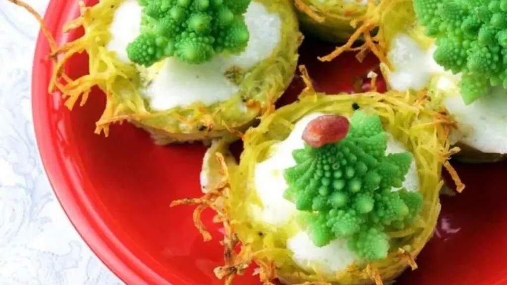 Mini quiches with edible broccoli tree toppers.