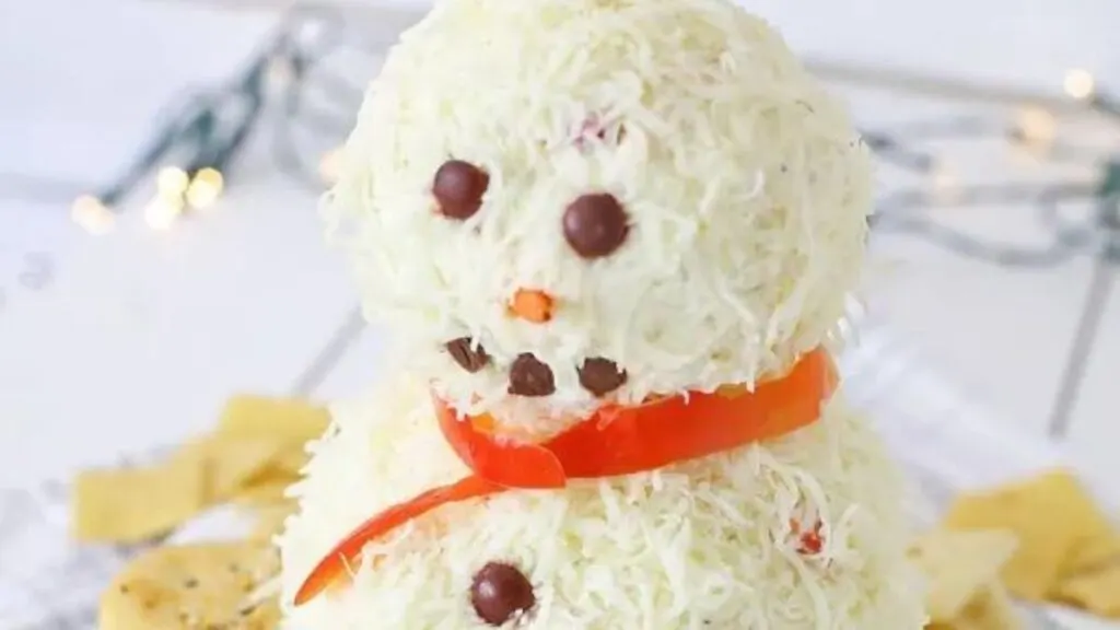 A cheese ball that looks like a snowman.