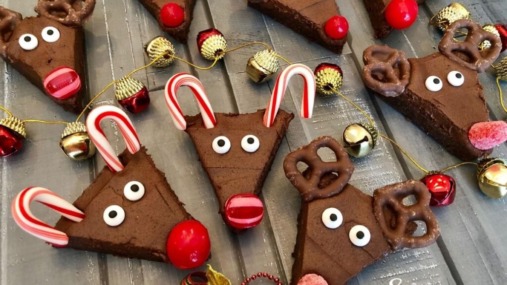 Brownies cut into triangles to look like reindeer faces.