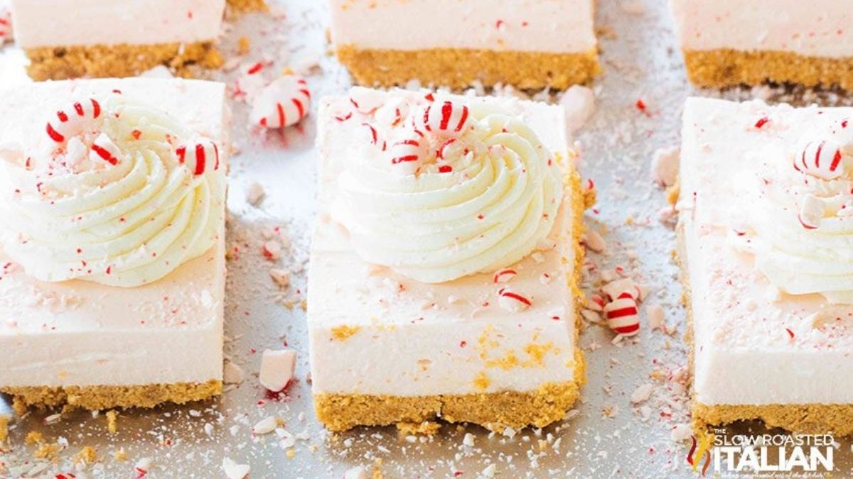 Squares of peppermint cheesecake with crushed candy.