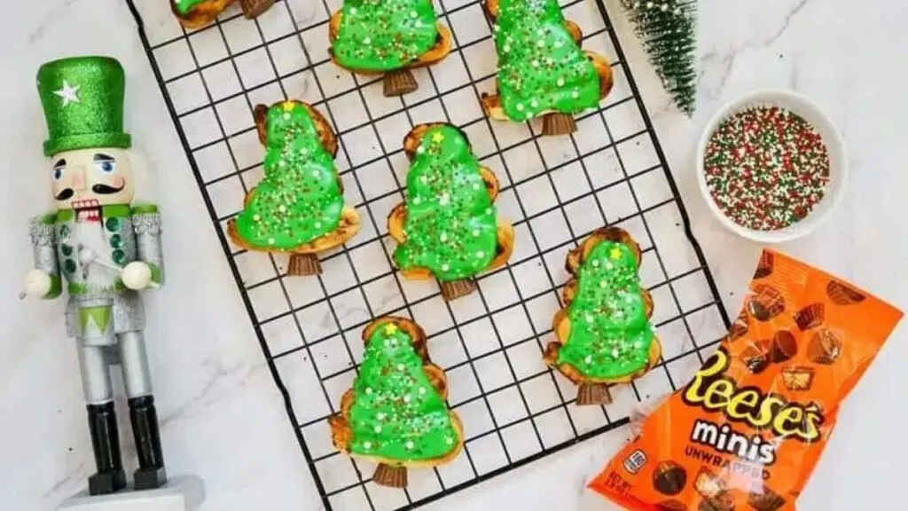 Cinnamon rolls shaped and decorated to look like Christmas trees.