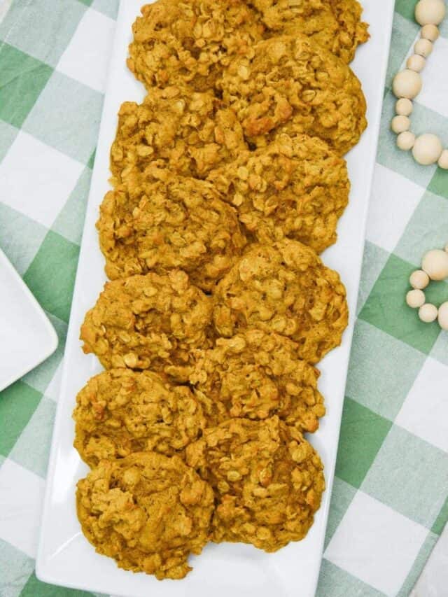 Pumpkin Oatmeal Drop Cookies on a white plate with a green and white checkered background