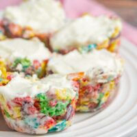 Fruity Pebbles Cheesecake Bites on a white plate