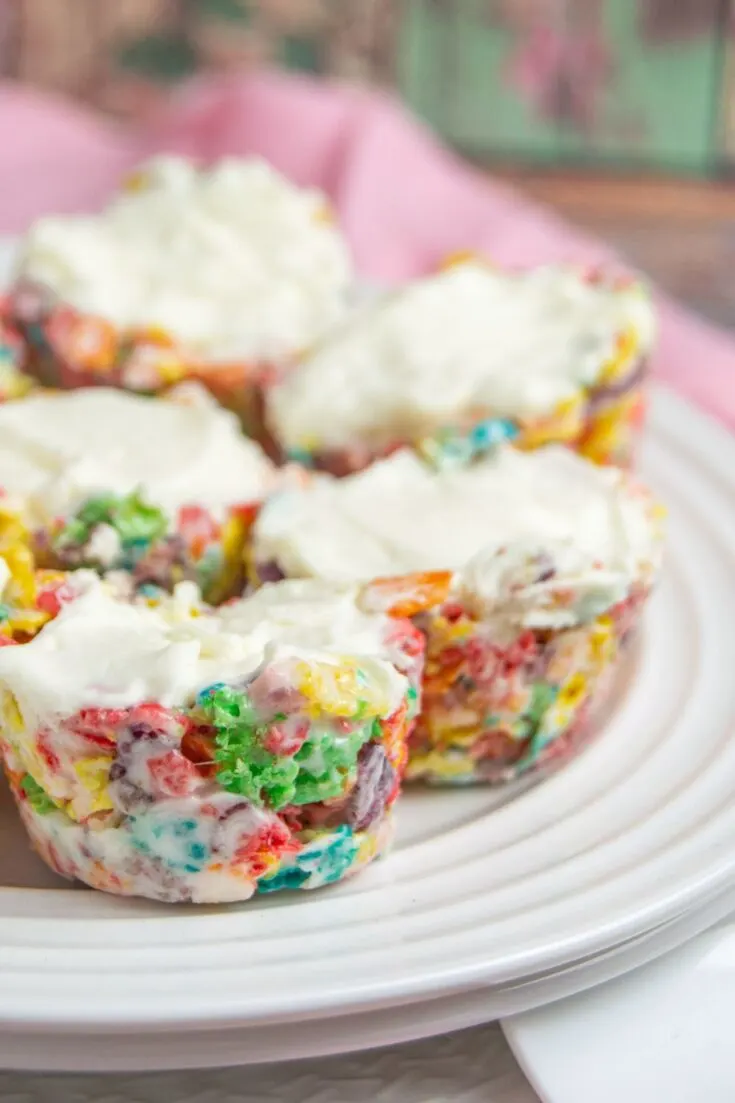 Fruity Pebbles Cheesecake Bites on a white plate