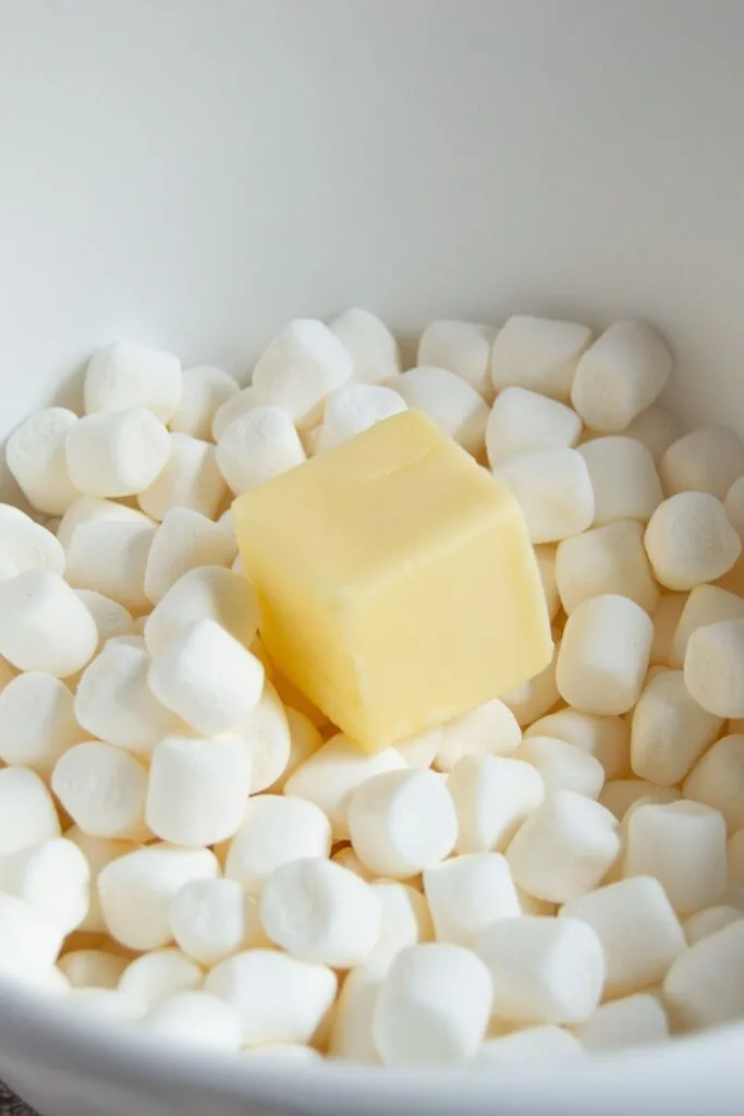 butter and mini marshmallows in a bowl
