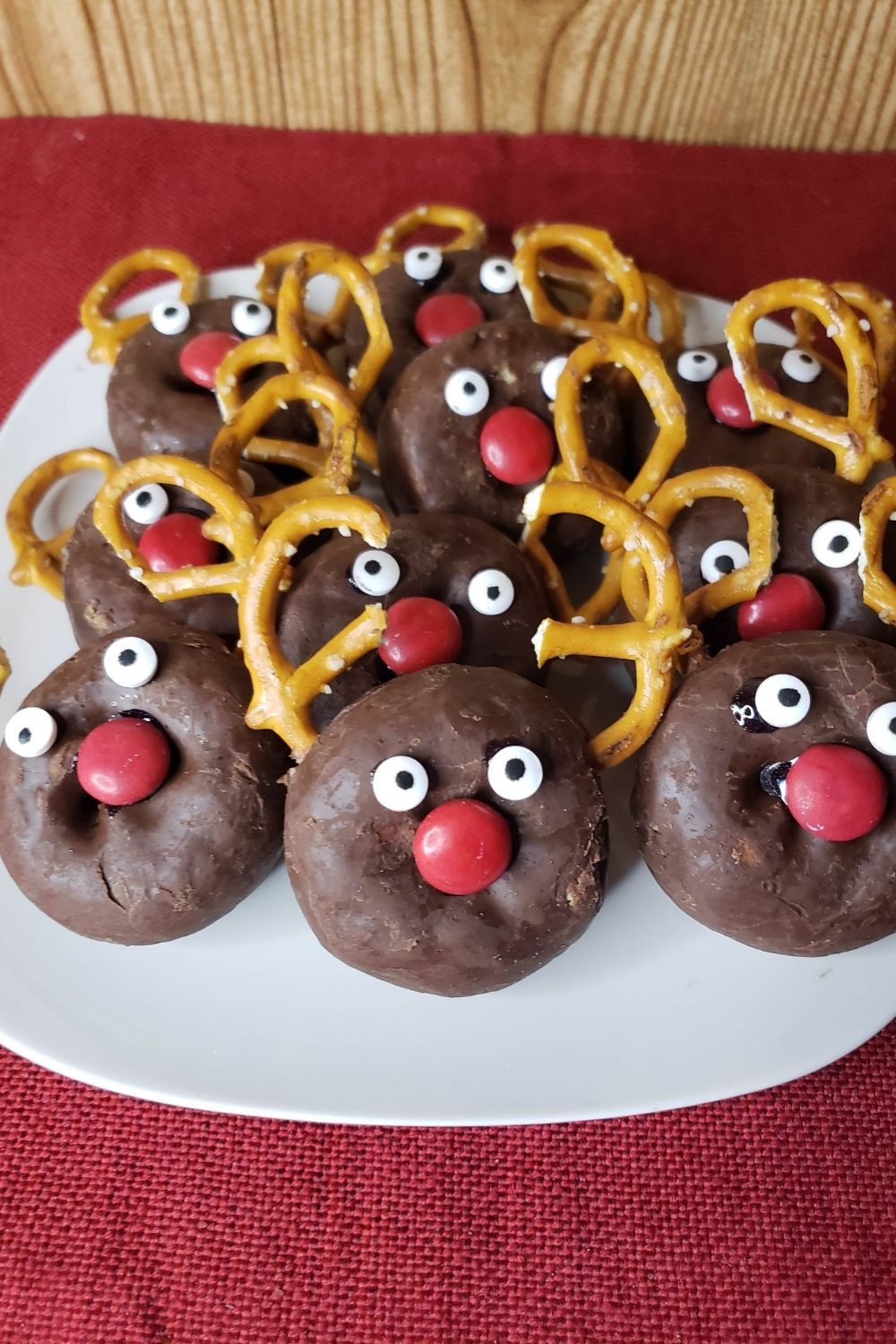 a pile of reindeer donuts on a plate