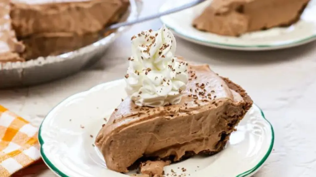 slice of chocolate pie with whipped cream on top