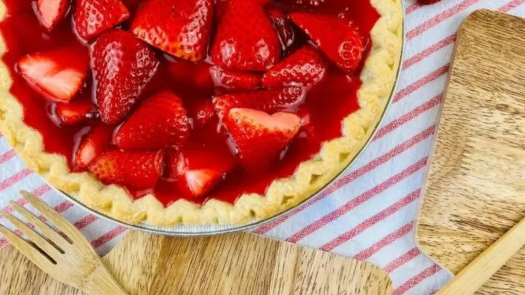 close up view of pie with strawberries