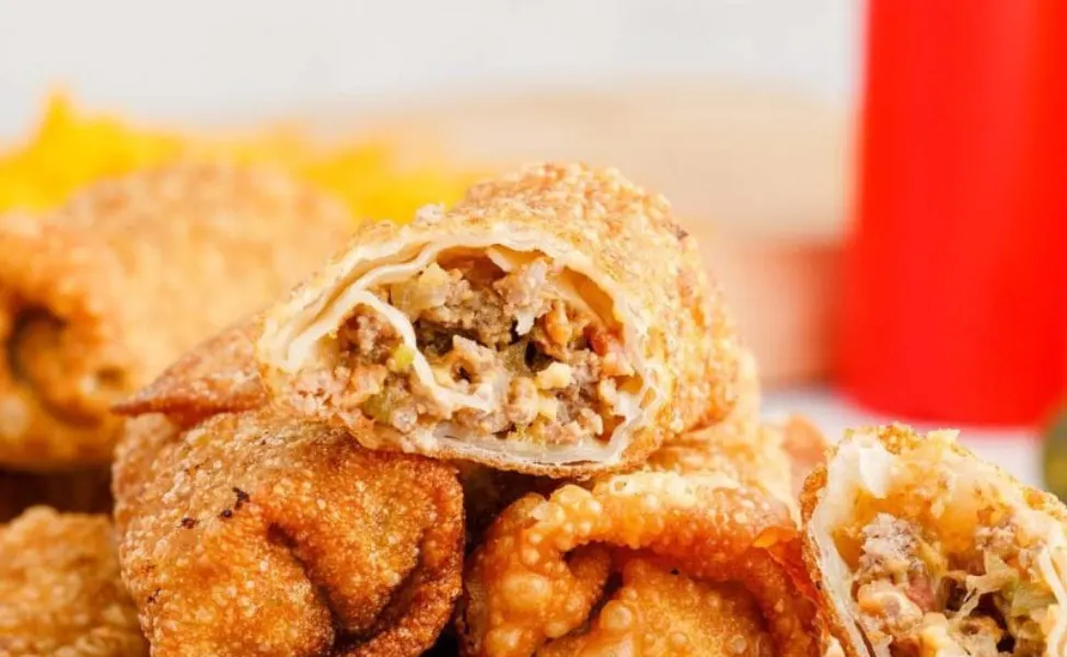Egg rolls filled with ground beef and cheese.