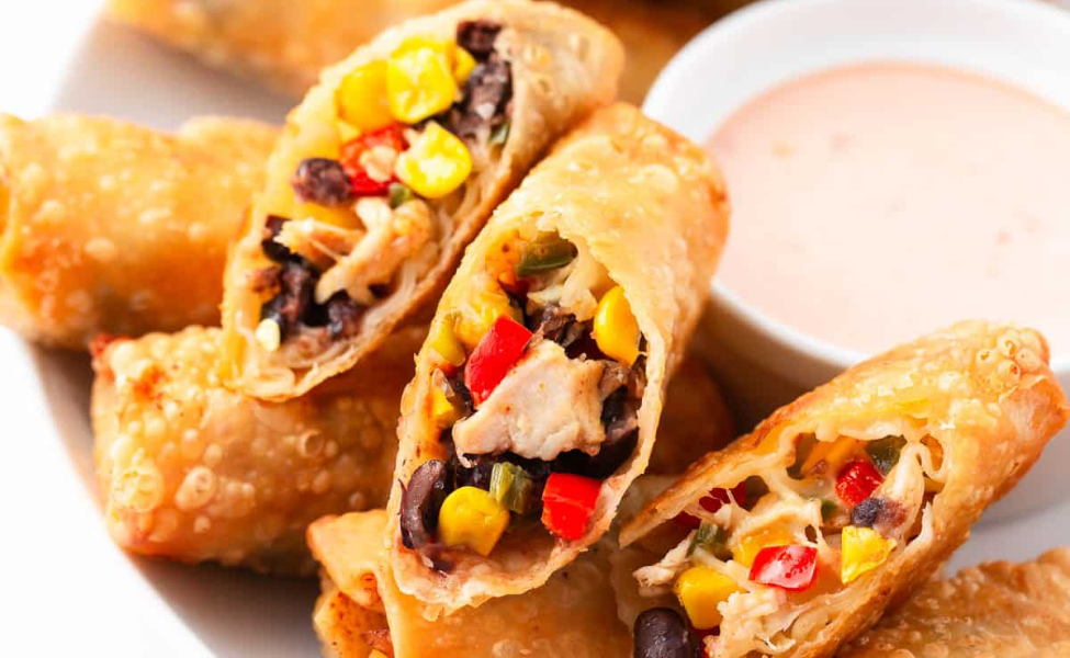 Egg rolls filled with chicken, corn and black beans.