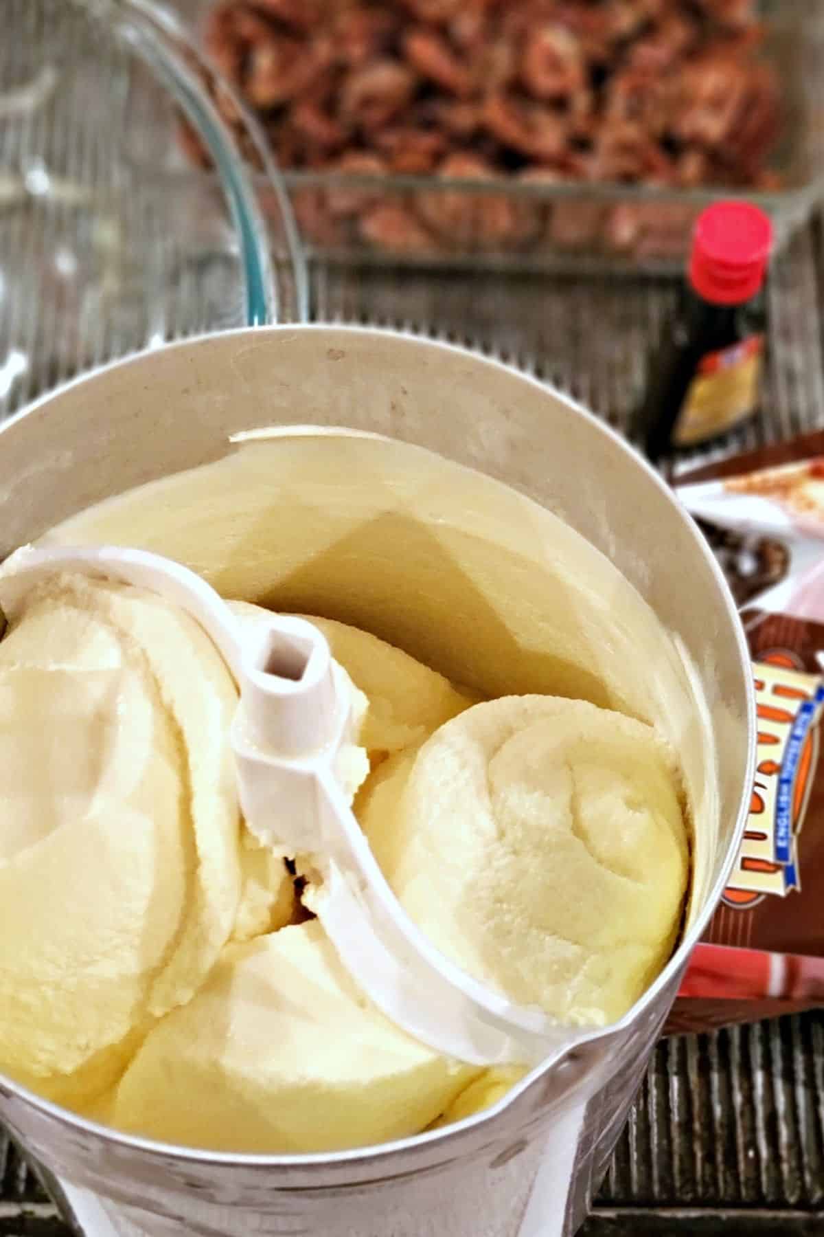 Ice cream being churned in an ice cream mixer.