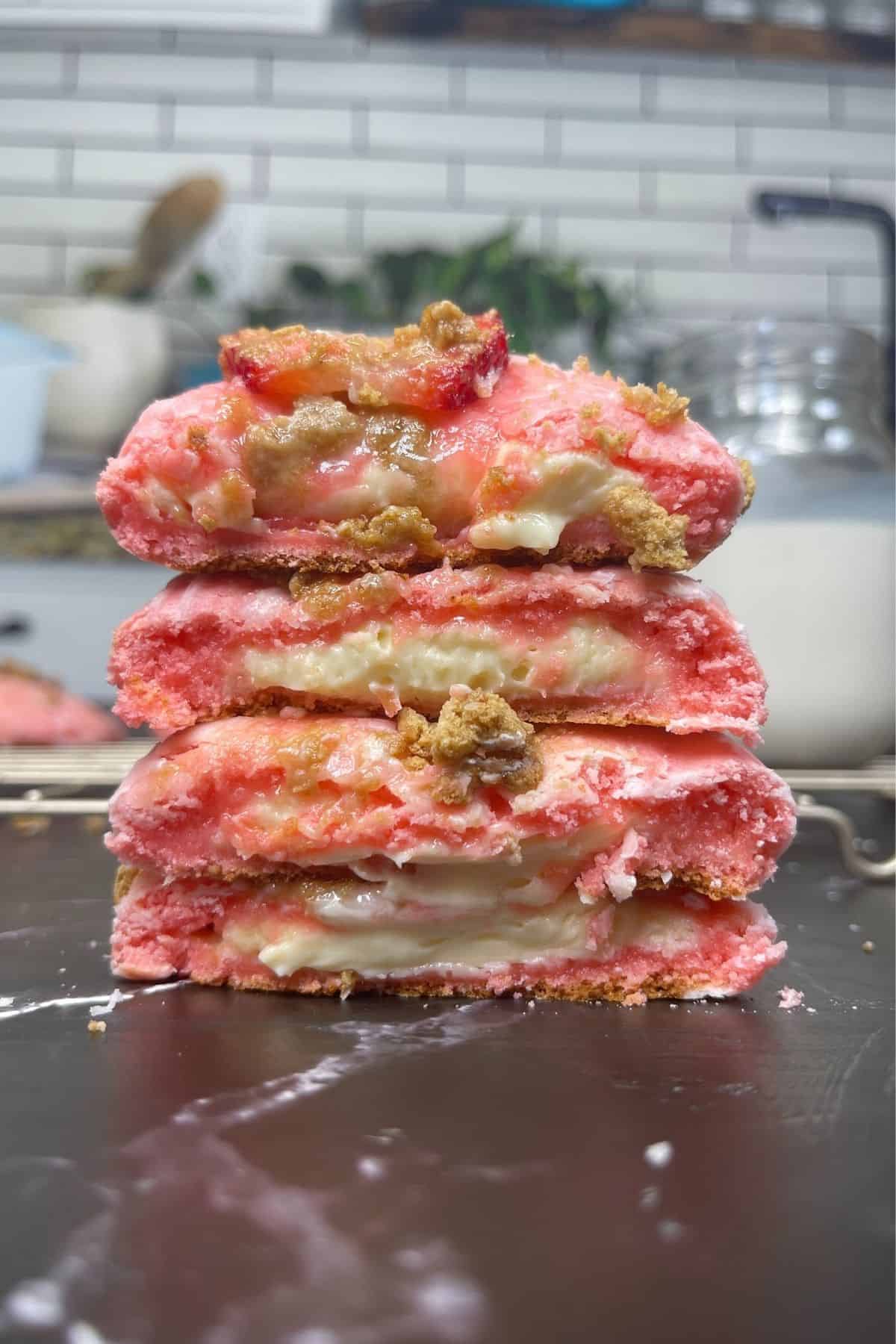 The inside view of these cheesecake strawberry cookies.